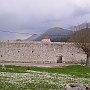 Wall around a church just next to teh Psophic ancient site